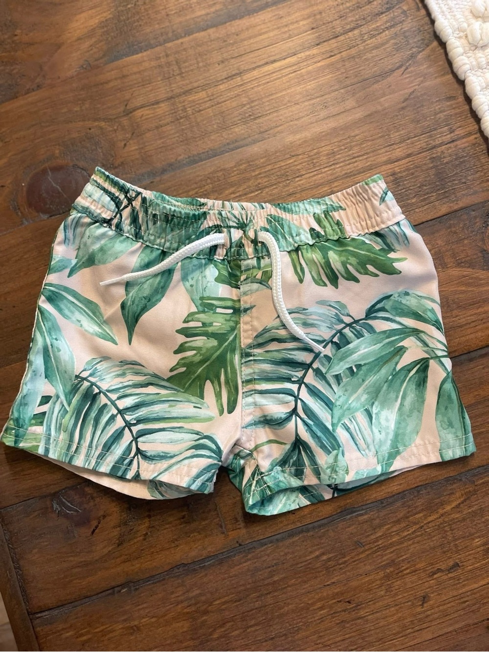 Tropical Leaf Print swim trunks